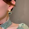 Retro-Tintenmalerei-Moskito-Spiral-Ohrclip für nicht gepiercte Ohren